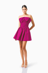 CURAAE Sabella Mini Dress in Magenta Pink with a strapless neckline posed shot 