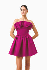 CURAAE Sabella Mini Dress in Magenta Pink with a strapless neckline close up shot 
