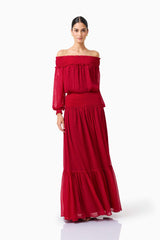 CURAAE Zanetta Off Shoulder Top & Maxi Skirt Set in Berry Red with long sleeves & off the shoulder posed front 