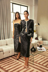 Model wears the CURAAE Keira Sequin Set in Black to a cocktail dinner 