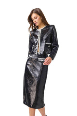CURAAE Keira Sequin Set in Black with long sleeves & midi skirt close up looking away shot