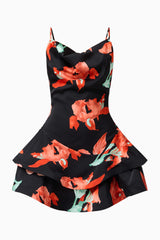 Brunette model wearing the CURAAE Maelis Cowl Neck Mini Dress in Black & Red Floral ghost shot