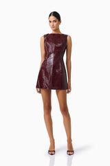 CURAAE Lorea Mini Dress in Burgundy with croc vegan leather fabrication posed shot