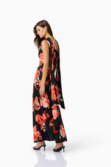 CURAAE Maelis Maxi Dress in Black & Red Floral with one shoulder & neck scarf back posed shot