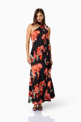 CURAAE Maelis Maxi Dress in Black & Red Floral with one shoulder & neck scarf posed shot