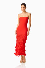 CURAAE Aurette Tiered Gown in Red with a strapless neckline & tiered skirt posed shot