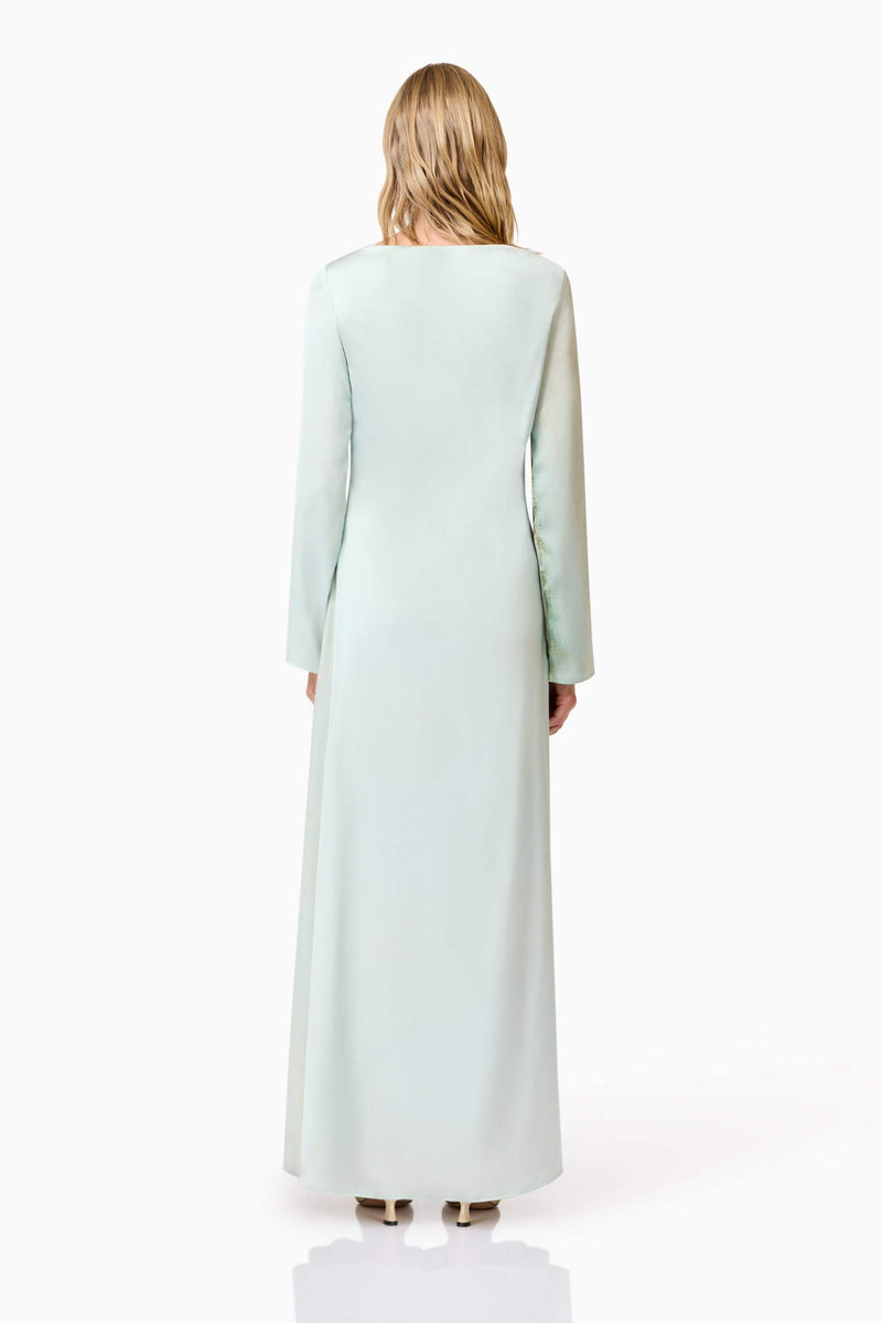 Blonde model wears Willow Satin Maxi Dress In Blue back shot