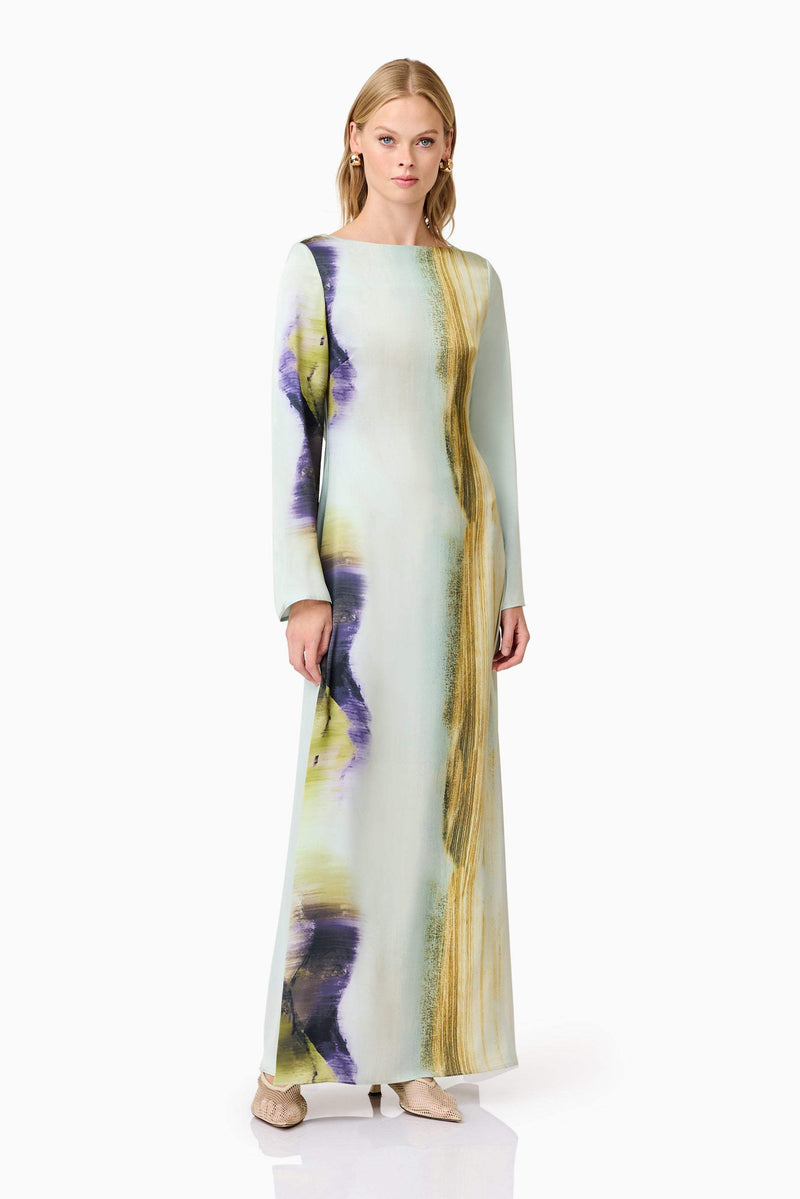 Blonde model wears Willow Satin Maxi Dress In Blue posed shot