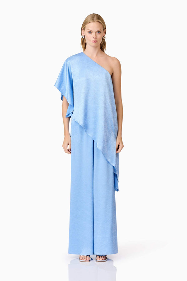 Blonde model wearing Fleur Satin Trousers in Blue front shot