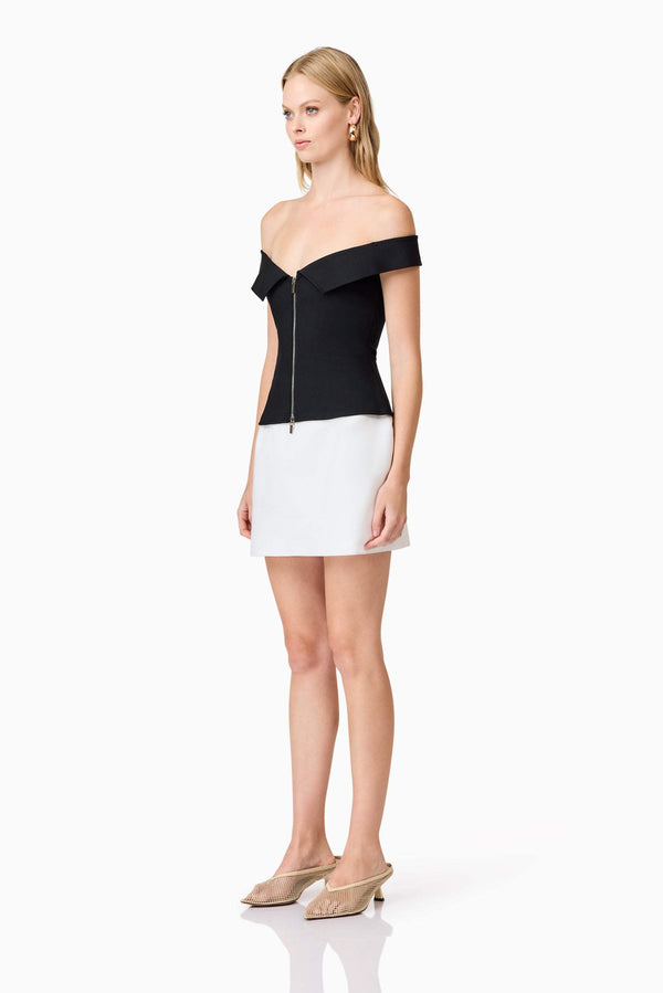 Blonde model wearing Khloe Crepe Knit Top In Black side shot