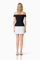 Blonde model wearing Khloe Crepe Knit Top In Black back shot