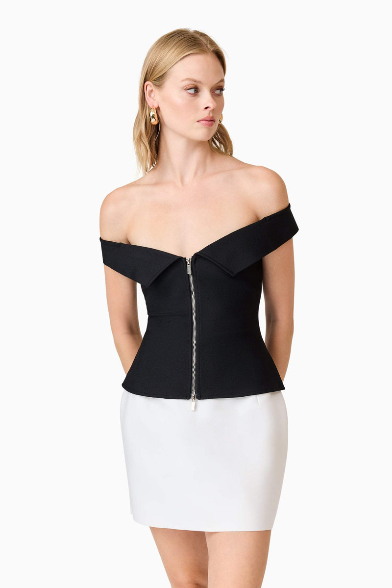 Blonde model wearingKhloe Crepe Knit Top In Black close up shot