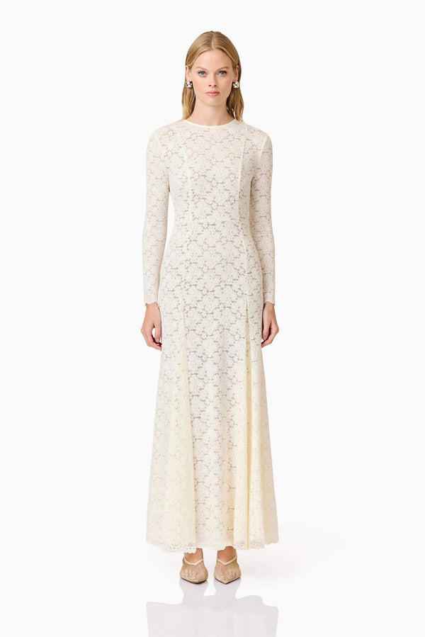 Blonde model wearing Kira Stretch Lace Maxi Dress In White front shot