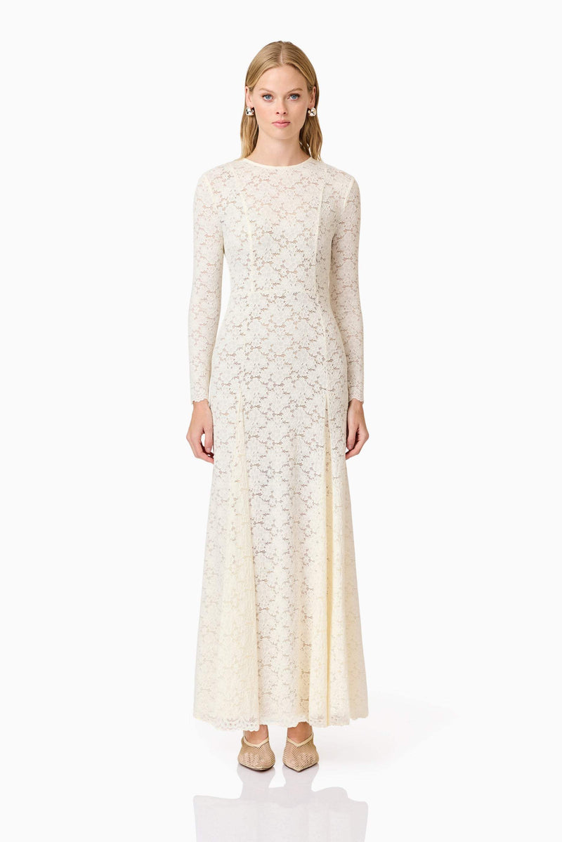 Blonde model wearing Kira Stretch Lace Maxi Dress In White front shot