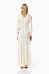 Blonde model wearing Kira Stretch Lace Maxi Dress In White back shot