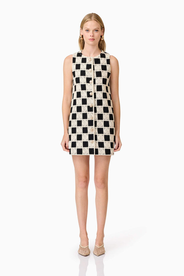 Blonde model wearing  Soho Crochet Mini Dress in Black & White front shot