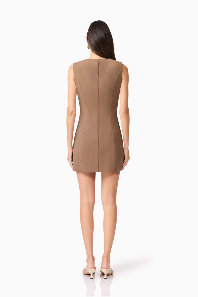 Brunette model wearing Sandy Suit Mini Dress In Brown back shot