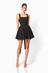CURAAE Morrigan Square Neck Mini Dress in Black with a square neckline & gathered skirt posed shot
