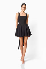 CURAAE Morrigan Square Neck Mini Dress in Black with a square neckline & gathered skirt posed walking shot