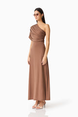 Brunette model wearing the CURAAE Gizelle Maxi Dress in Brown side shot