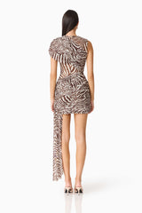 Brunette woman in the Arabelle Mini Dress in Chocolate Zebra Print back shot