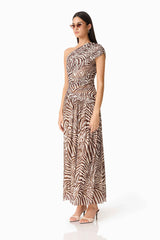 Brunette woman in CURAAE Arabelle Maxi Dress in Chocolate Zebra Print side shot