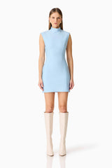 Brunette model wearing the Sacha Mini Dress in Baby Blue front shot 
