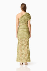 Brunette model wearing the Fiorella Skirt in Pistachio Green back shot 

