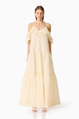 Brunette model wearing the Maribelle Maxi Dress in Lemon Yellow front shot 