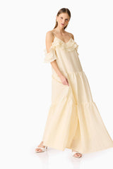 Brunette model wearing the Maribelle Maxi Dress in Lemon Yellow posed shot 