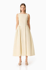 Brunette model wearing the Lavelle Maxi Dress in Lemon Yellow front shot