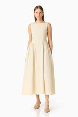 Brunette model wearing the Lavelle Maxi Dress in Lemon Yellow posed shot
