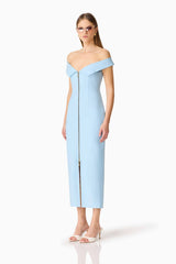 Brunette model wearing the Sacha Maxi Dress in Baby Blue side shot 
