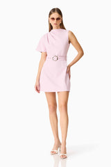 Brunette model wearing the Celie Mini Dress in Blush Pink posed shot