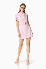 Brunette model wearing the Celie Mini Dress in Blush Pink posed shot