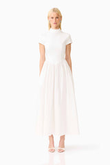 Blonde model wearing the Amaris Midi Dress in White front shot 