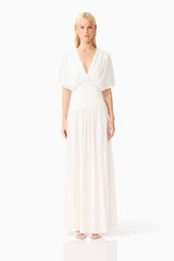 Blonde model wearing the CURAAE Amaris Maxi Dress in White front shot
