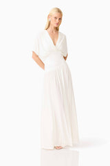 Blonde model wearing the CURAAE Amaris Maxi Dress in White posed shot