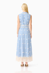 Blonde model wearing the CURAAE Estella Midi Dress in Blue & Cream back shot
