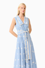 Blonde model wearing the CURAAE Estella Midi Dress in Blue & Cream close up shot