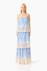 Blonde model wearing the CURAAE Estella Maxi Dress in Blue & Cream front shot 