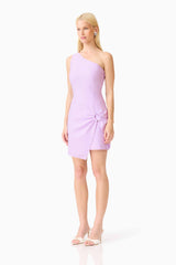Blonde model wearing the Rafaella One Shoulder Mini Dress in Purple side shot