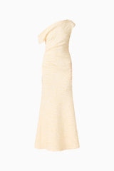 Brunette model wearing the CURAAE Faye One Shoulder Maxi Dress in Cream ghost shot 