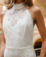 Model wears Clarisse Halter Neck Gown in White to elopement event 