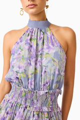 Brunette model wearing Milena Halter Mini Dress in Purple Floral top detail shot