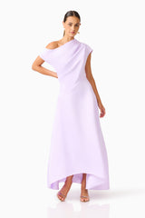 Brunette model wearing Marissa One Shoulder Gown in Purple hand on hip posed shot