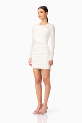 Brunette model wearing Darya Long Sleeve Mini Dress in White side shot