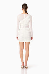 Brunette model wearing Darya Long Sleeve Mini Dress in White back shot