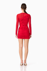 Brunette model wearing Darya Long Sleeve Mini Dress in Red back shot