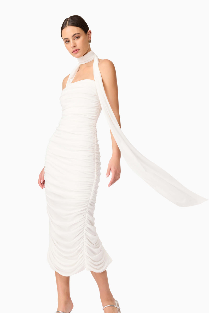 Brunette model wearing Darya Fitted Midi Dress in White close up posed shot